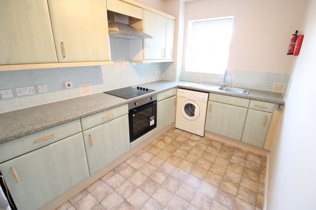 Property photo 3 of 7 Kitchen
