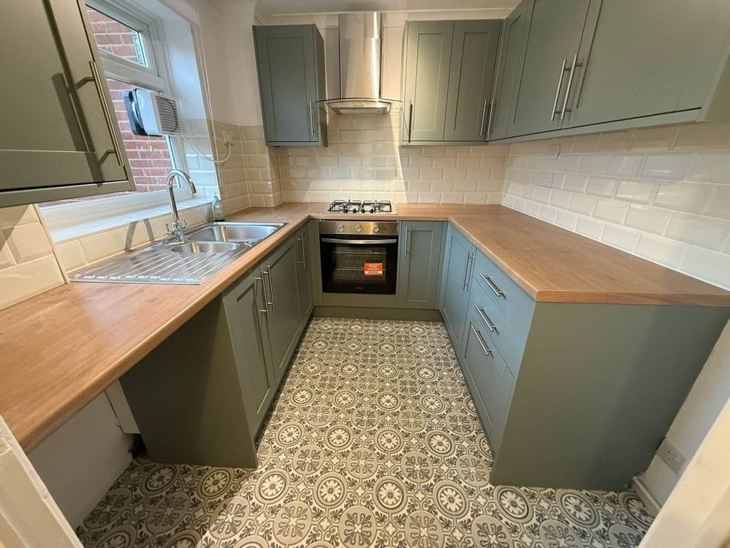 Property photo 2 of 12 Kitchen