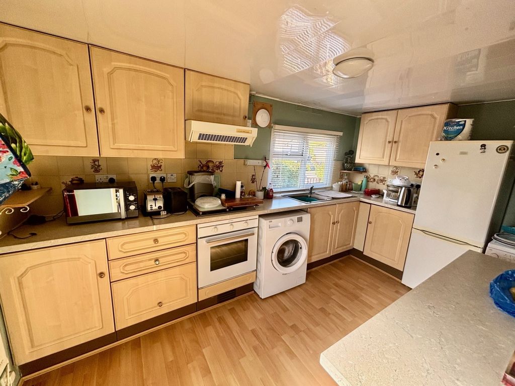 Property photo 2 of 8 Kitchen