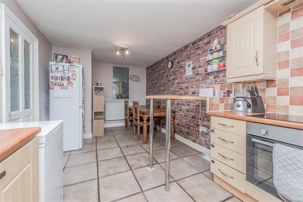Property photo 3 of 24 Dining Kitchen:
