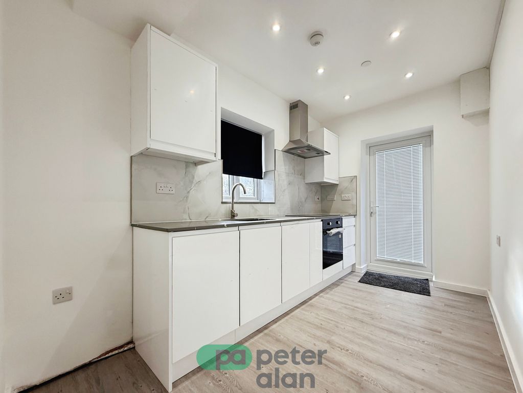 Property photo 3 of 8 Front