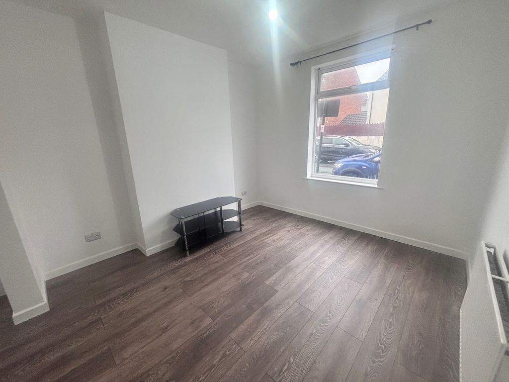 Property photo 3 of 9 Living Room