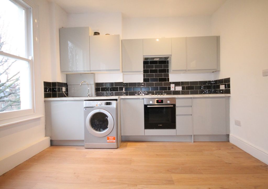 Property photo 1 of 8 Kitchen
