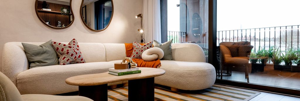 Property photo 1 of 4 Closeup Photo Of Bevelled Coffee Table, L-Shaped Sofa, Next To Balcony
