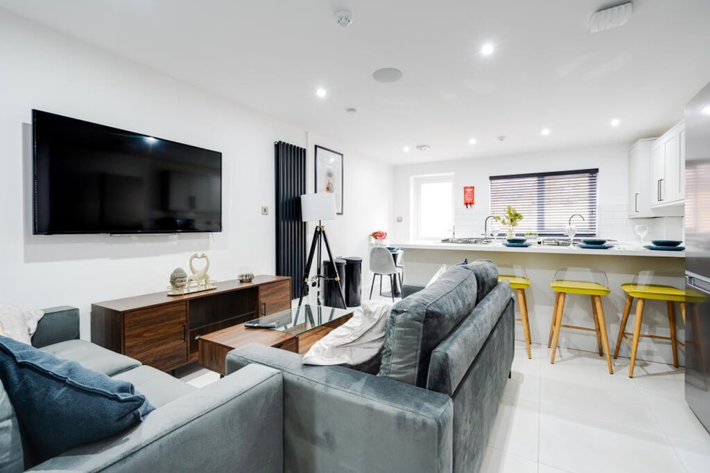 Property photo 1 of 15 This Contemporary Living Room Features A Spacious ...