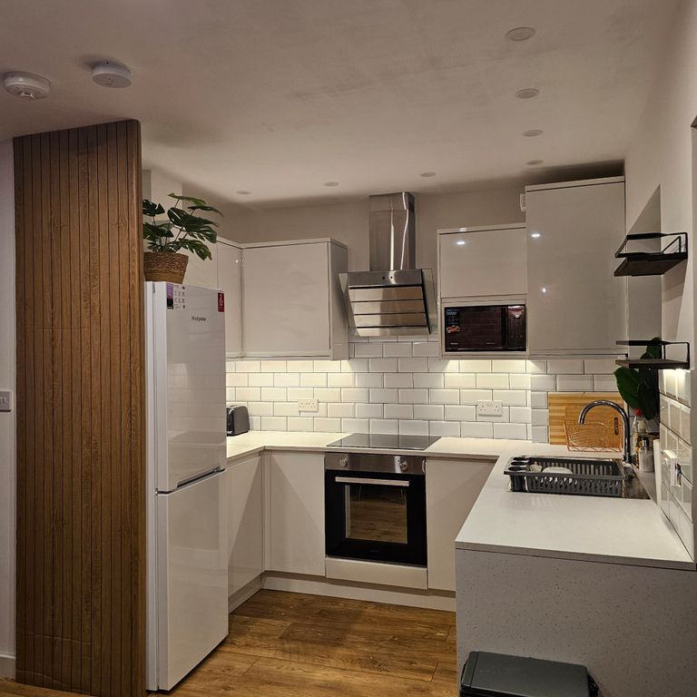 Property photo 3 of 12 Kitchen