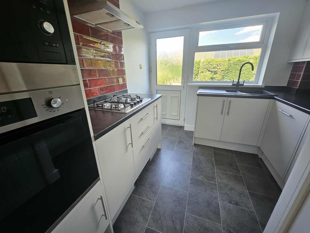 Property photo 3 of 13 Kitchen