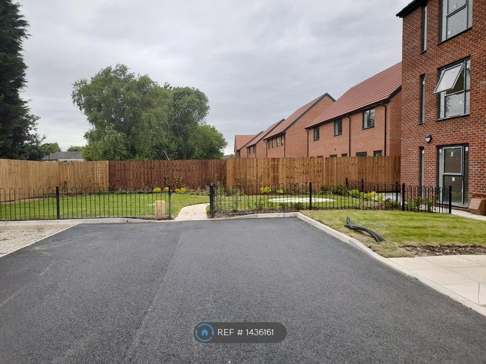 Property photo 2 of 12 Back Of Apartments