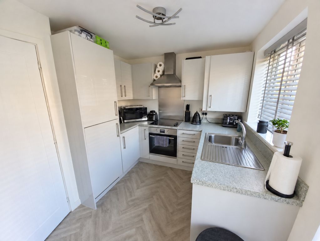 Property photo 3 of 13 Dining Kitchen