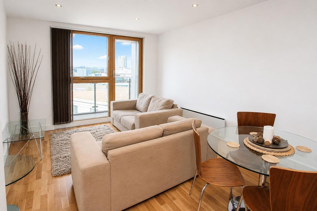 Property photo 1 of 6 Bright Modern Living Room With Large Window...