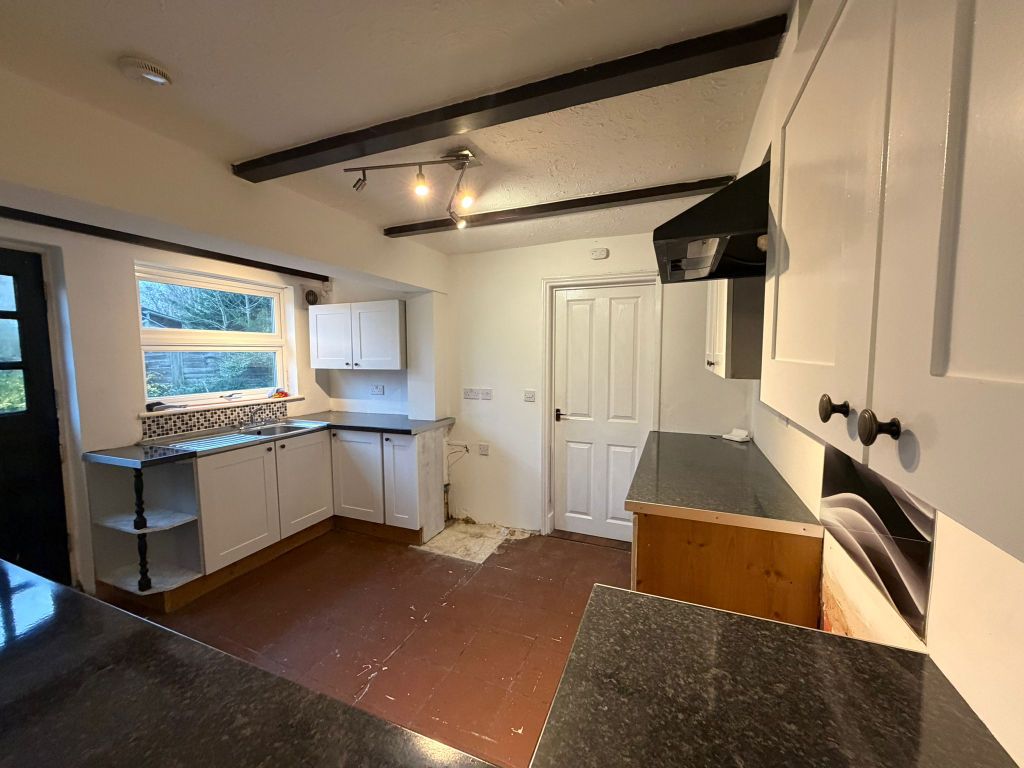 Property photo 3 of 12 Kitchen