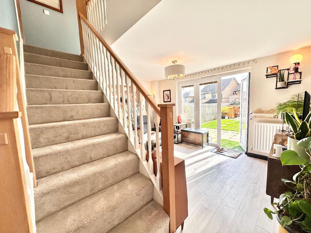 Property photo 2 of 18 Central Staircase Leads To