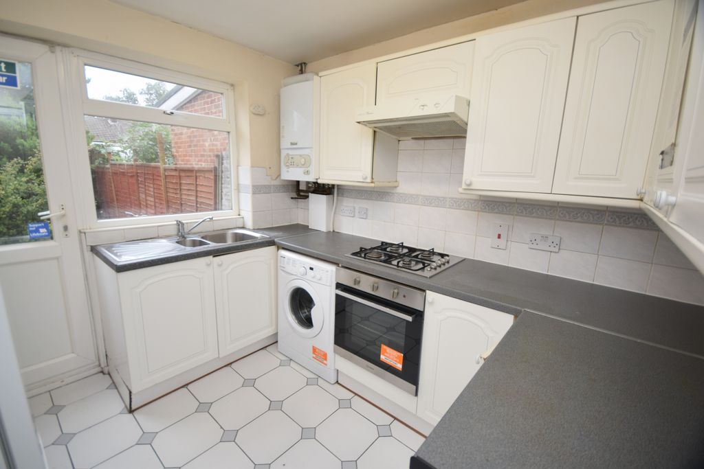 Property photo 3 of 12 Kitchen