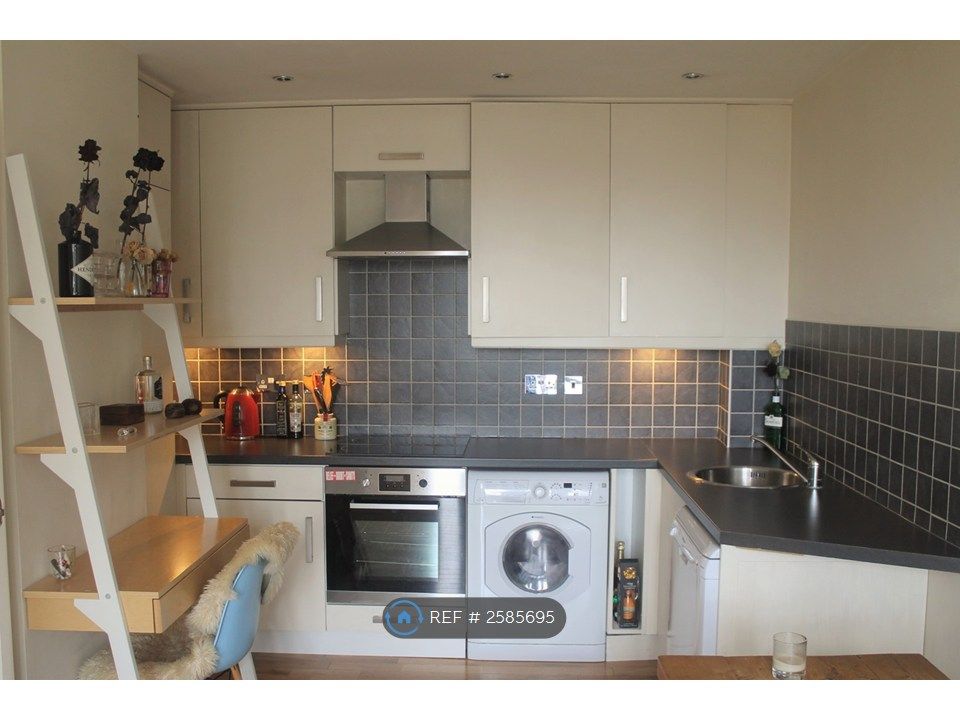 Property photo 3 of 12 Kitchen Area
