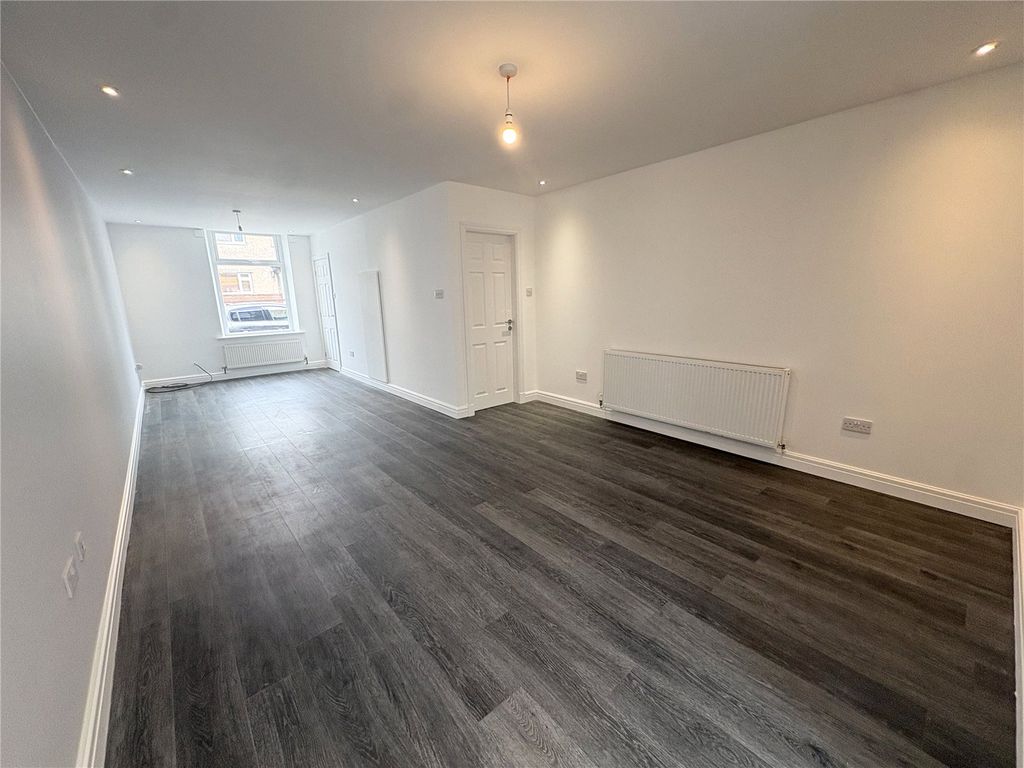 Property photo 3 of 15 Living Area