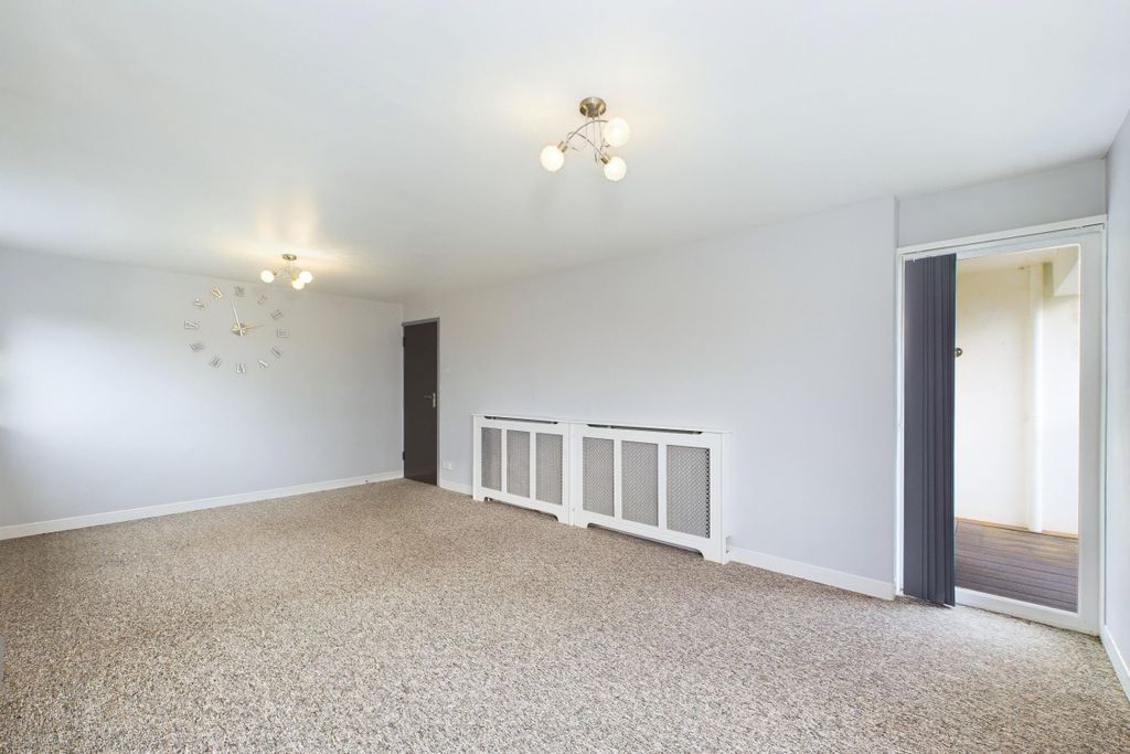 Property photo 3 of 23 Living Room With Balcony Access