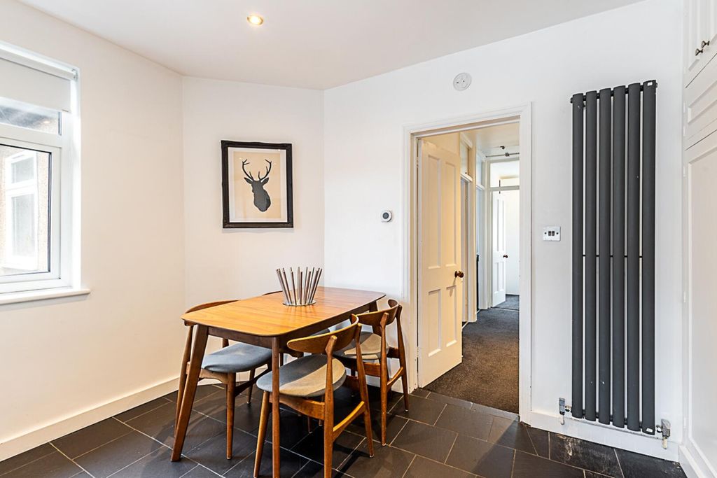 Property photo 3 of 15 Byja - 16 Kimble Road Sw19 2As-19.Jpg