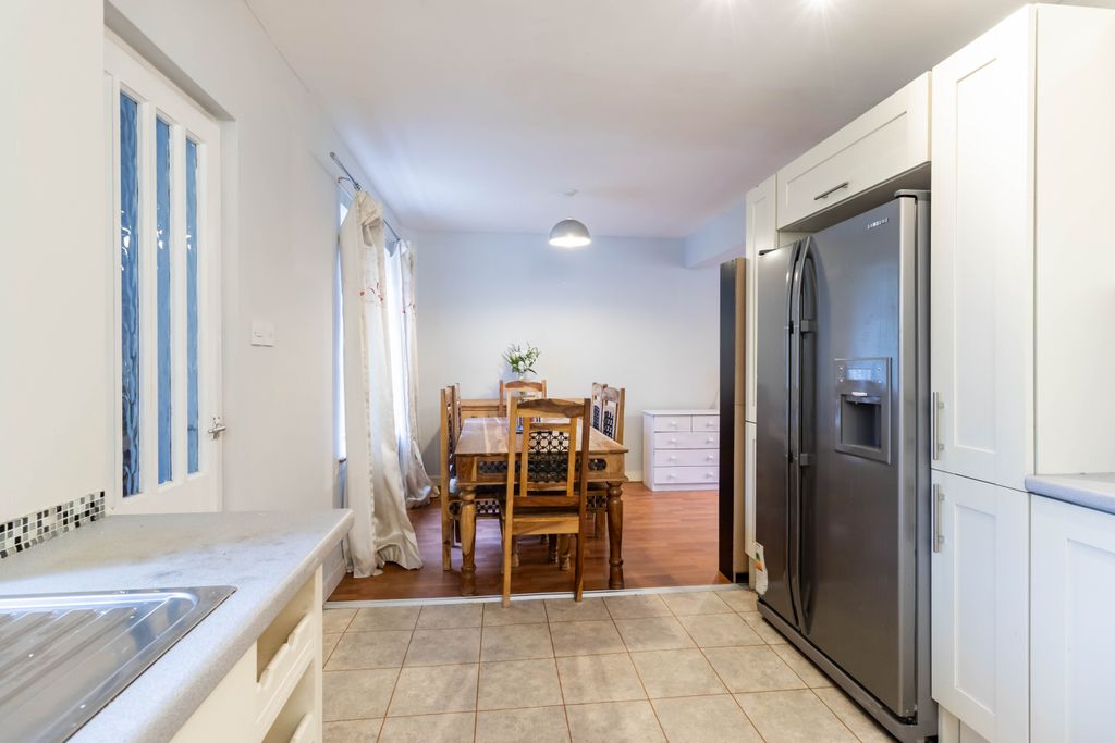 Property photo 3 of 24 Dining Kitchen