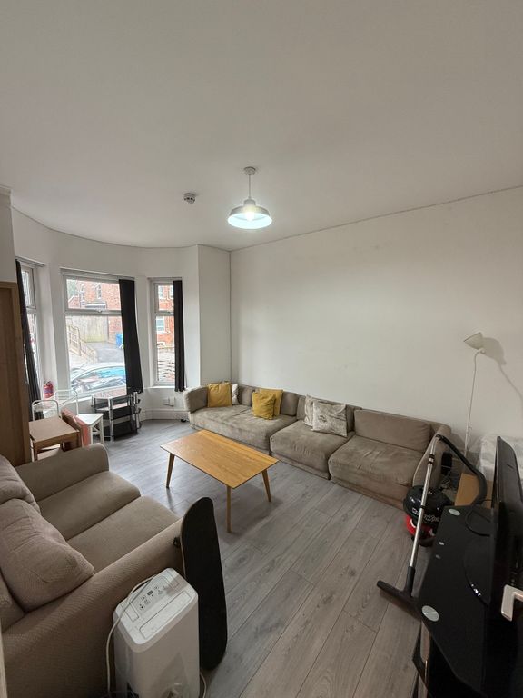 Property photo 2 of 11 A Comfortable And Functional Living Room Featuring...