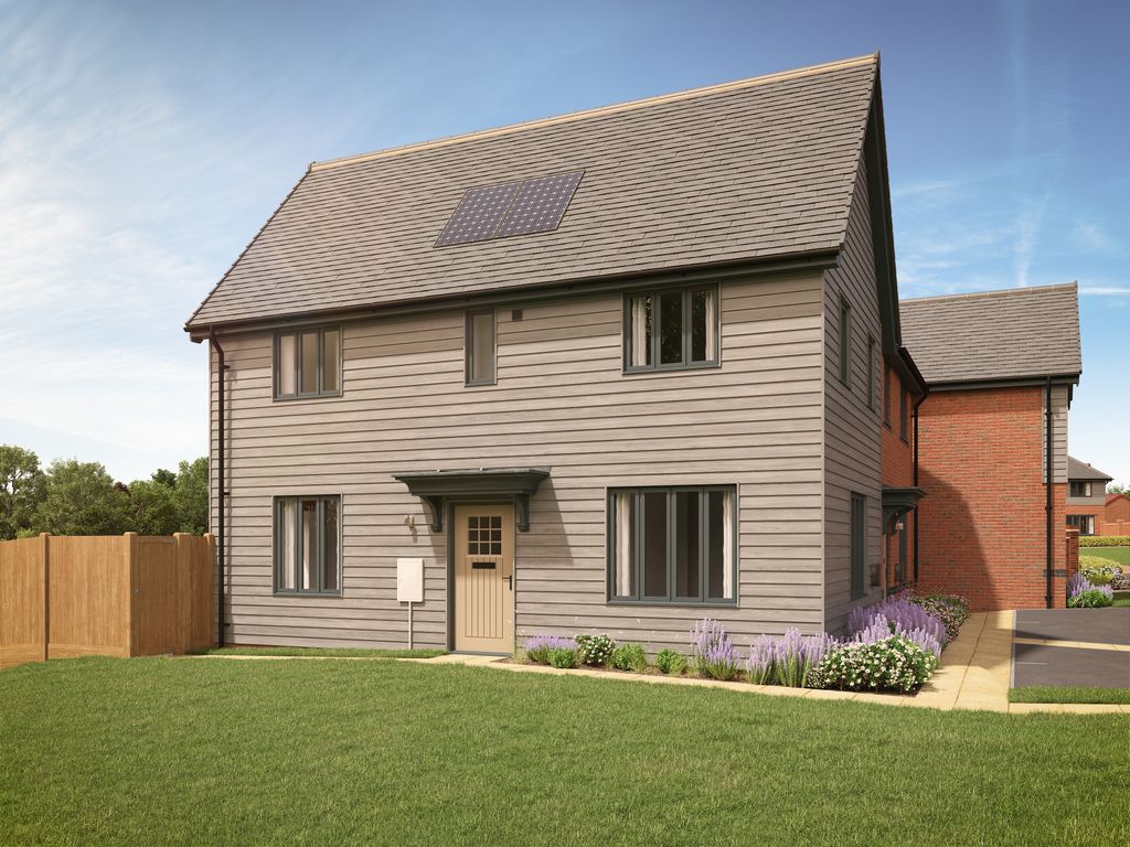 Property photo 1 of 10 A Modern Grey-Clad House With Solar Panels On The Roof Sits In A Manicured Lawn With Purple Flowers