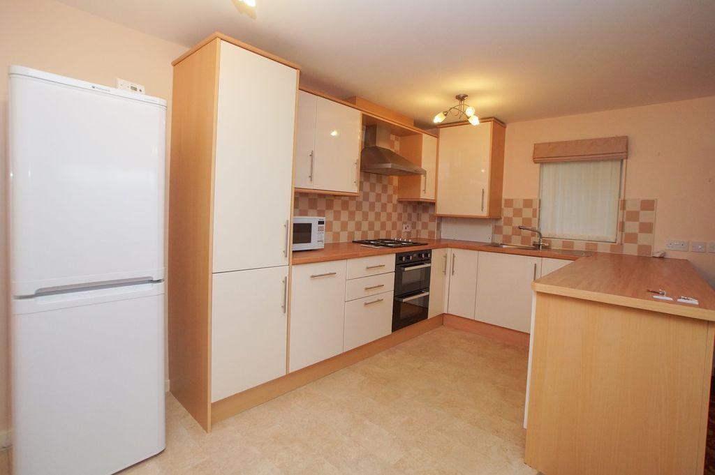 Property photo 2 of 14 Kitchen Area
