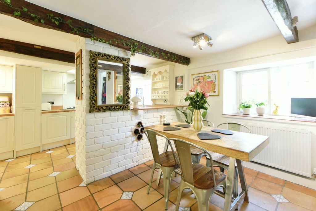 Property photo 2 of 17 Dining Kitchen
