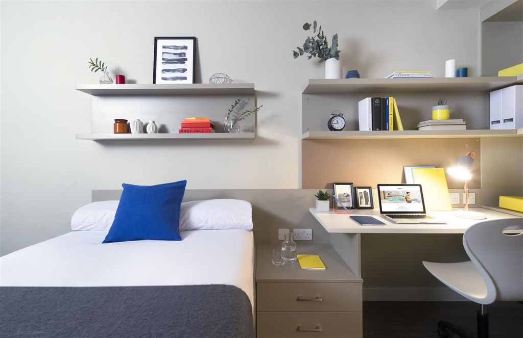 Property photo 2 of 5 Urbst_Melbourne_Room_ Dressed Bed And Desk Area.Jp