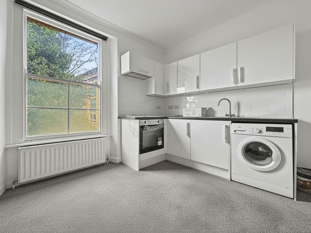 Property photo 3 of 11 Modern White Kitchen With Bright Sash Window...