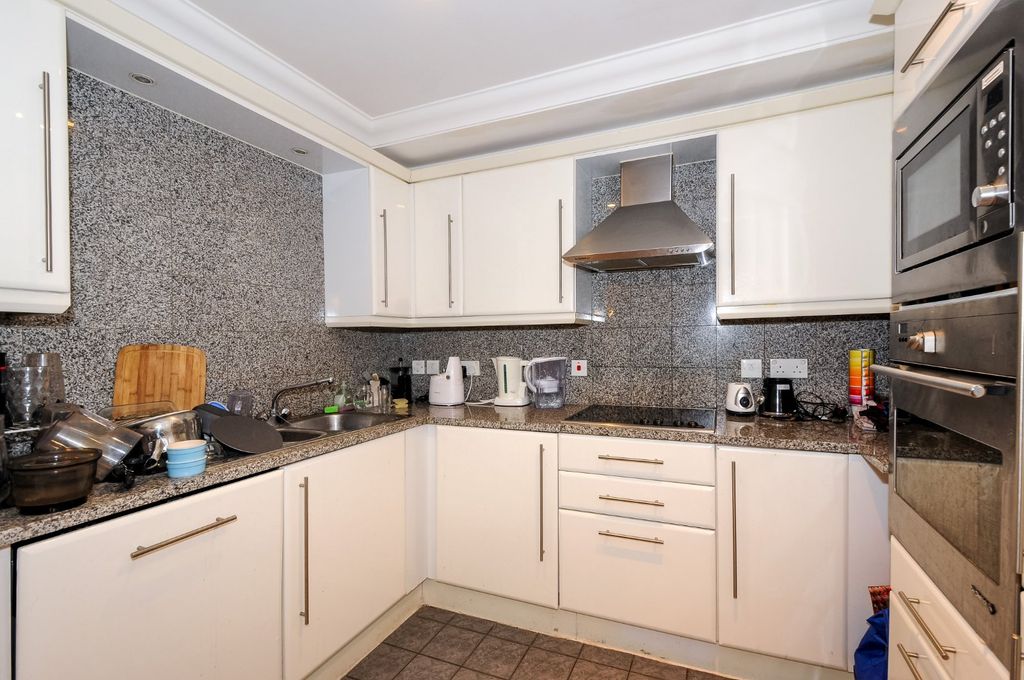 Property photo 3 of 8 Kitchen