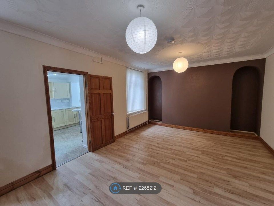 Property photo 3 of 17 Rear Living Room