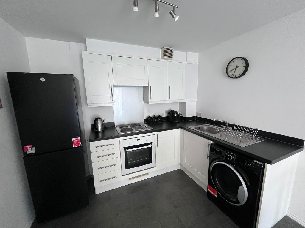 Property photo 3 of 6 Kitchen