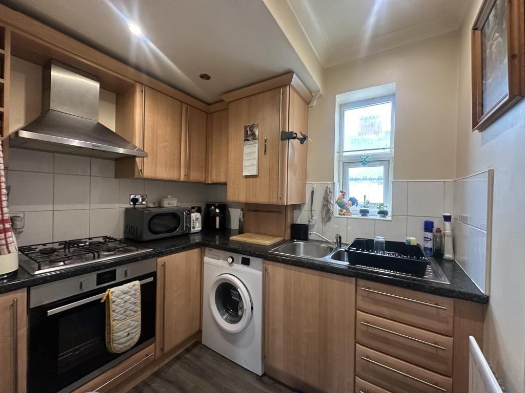Property photo 3 of 7 Kitchen