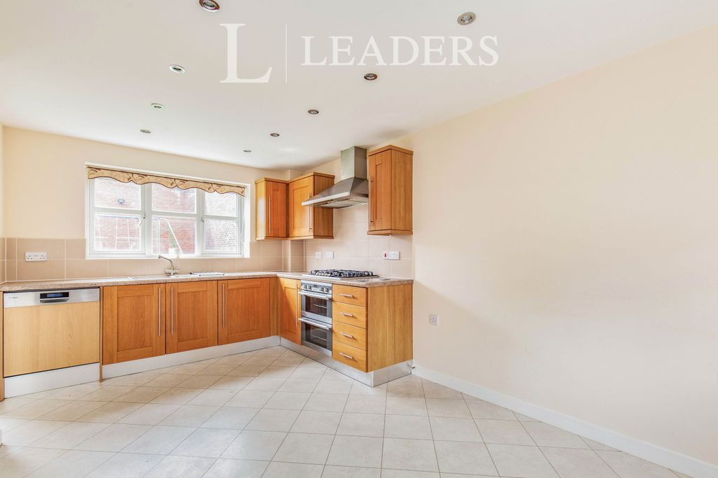 Property photo 3 of 12 Dining Kitchen