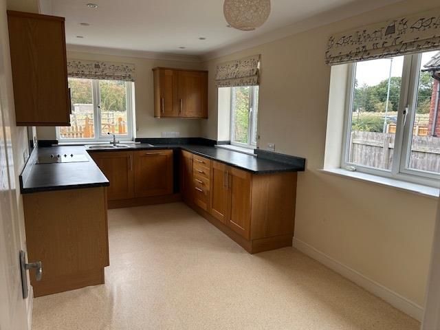 Property photo 3 of 12 Kitchen