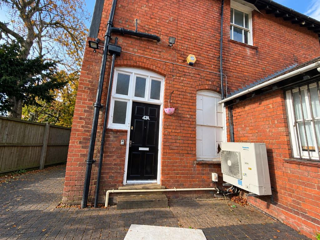Property photo 1 of 12 Autumn Light On Brick Townhouse.Png