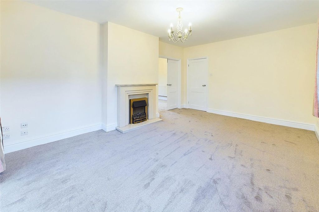 Property photo 2 of 12 Living Area