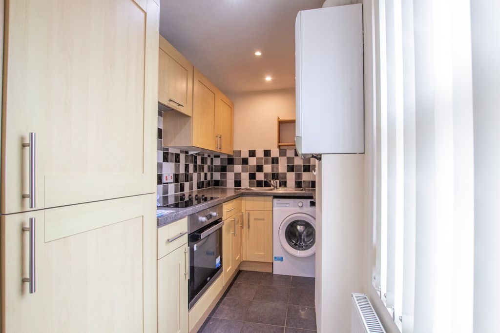 Property photo 2 of 12 Kitchen