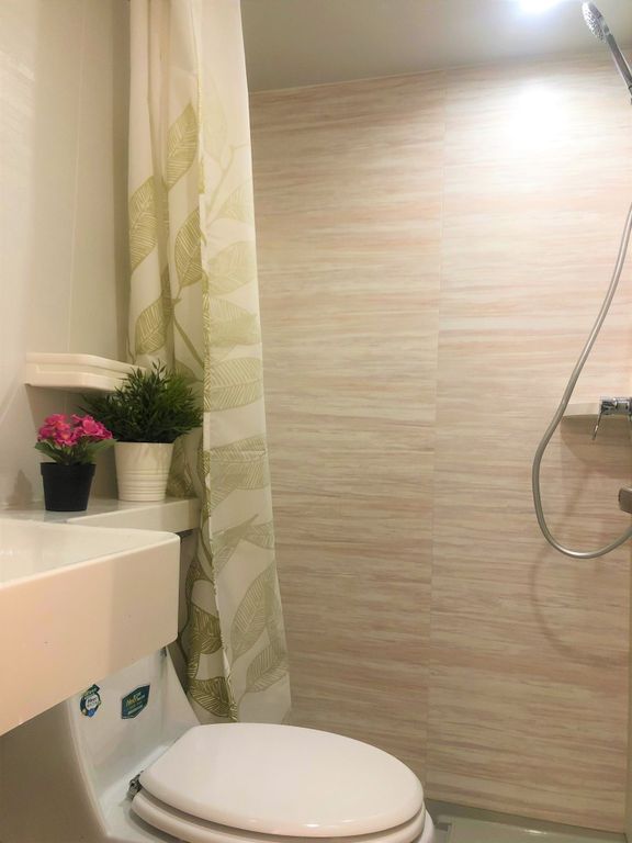 Property photo 3 of 8 A Clean And Modern Bathroom Featuring A Shower Are...