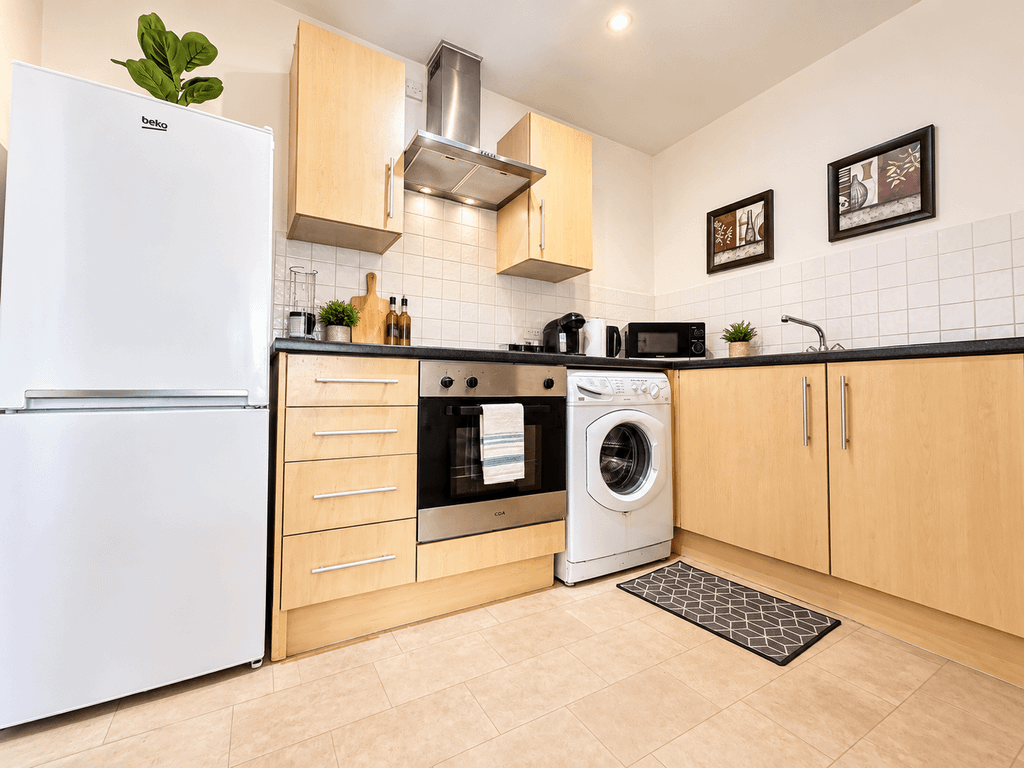 Property photo 3 of 8 Kitchen
