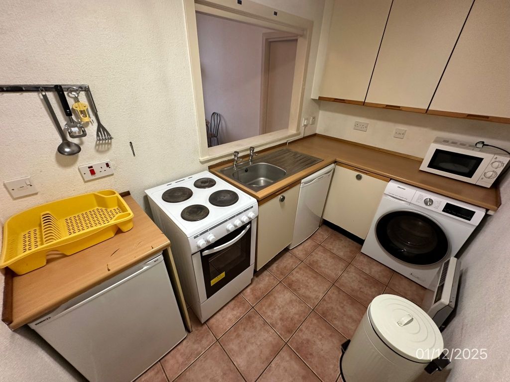 Property photo 2 of 8 Kitchen