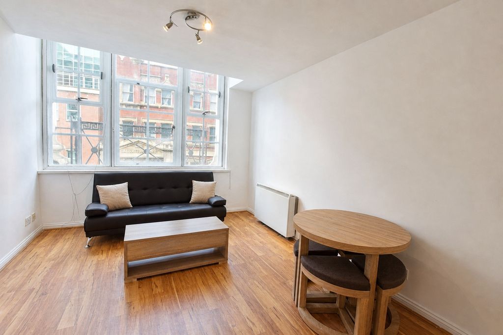 Property photo 1 of 7 Bright Lounge With Large Windows And Wood Floors...