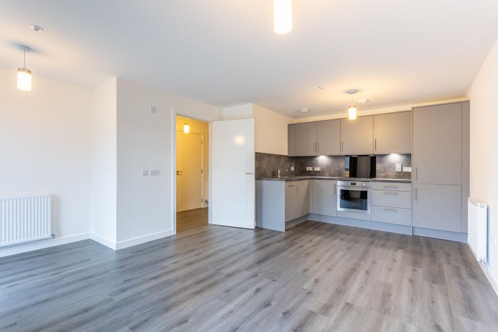 Property photo 1 of 8 Living Room &amp; Kitchen Area
