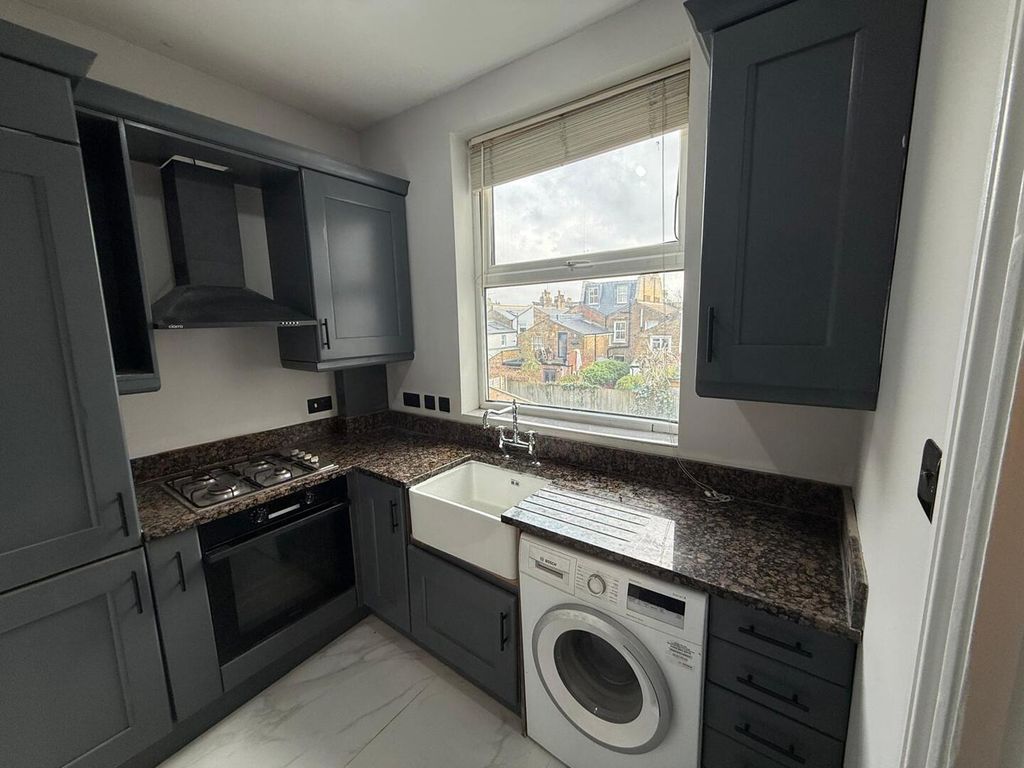 Property photo 2 of 11 Kitchen