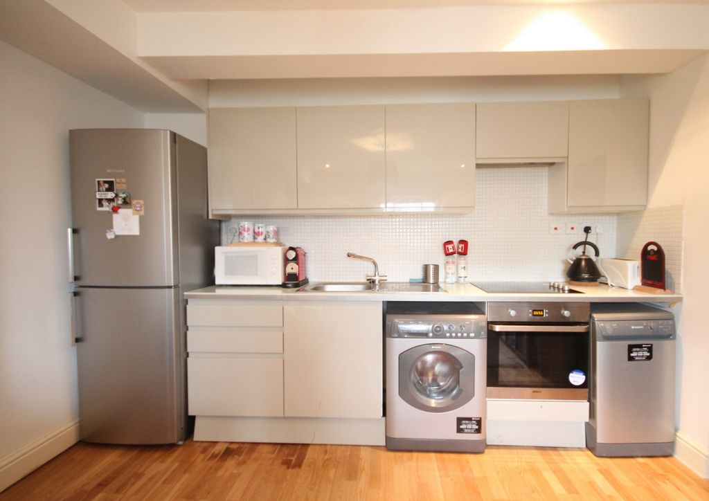Property photo 3 of 7 Kitchen