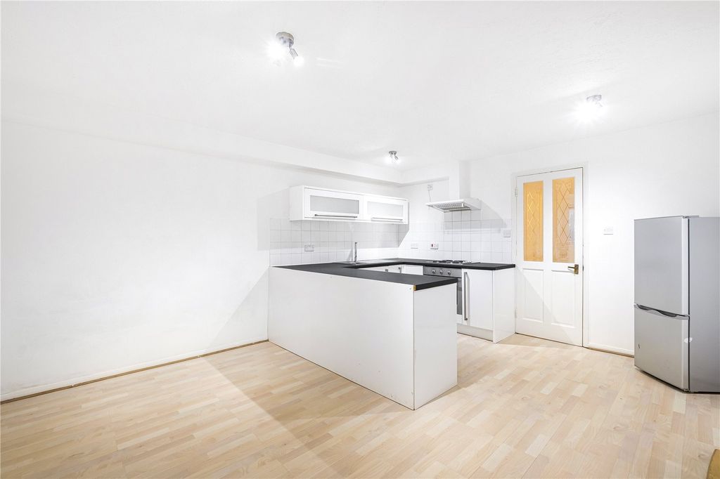 Property photo 1 of 8 Kitchen/Living Room
