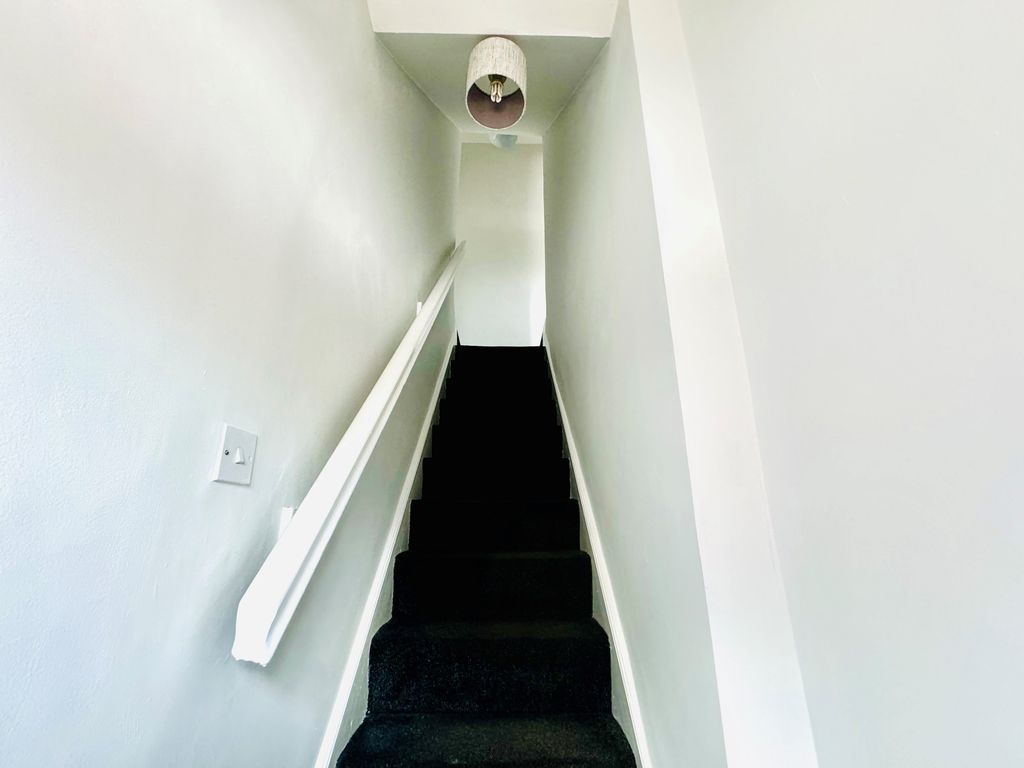 Property photo 2 of 7 109A Hallway Stairs