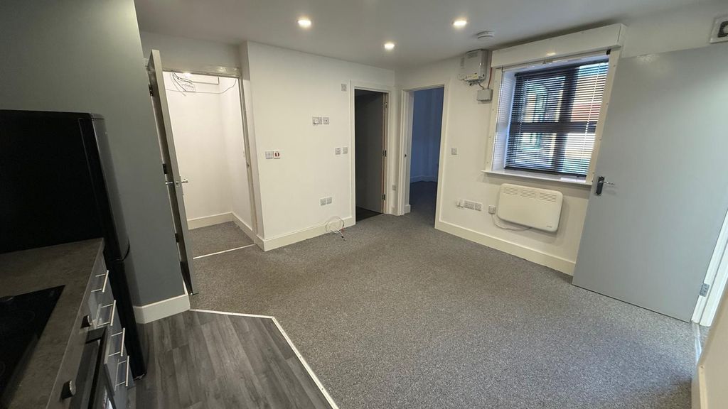 Property photo 3 of 17 Living Room + Kitchen