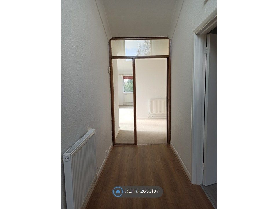 Property photo 2 of 24 Hallway Leading To Living Room