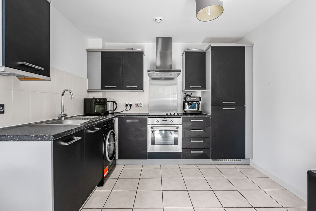 Property photo 3 of 12 Kitchen