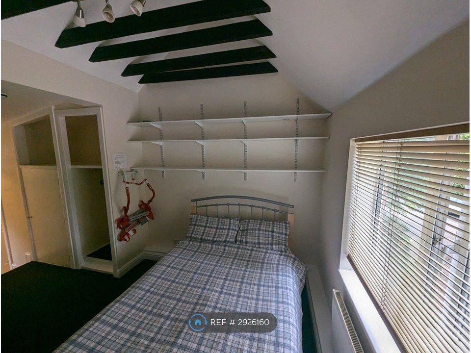 Property photo 1 of 15 There Is A Double Bed With Lots Of Shelves Above